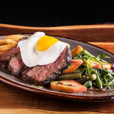 Steak and Eggs, with veggies and fries.