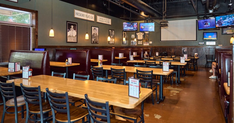 Dining area, TVs on the walls