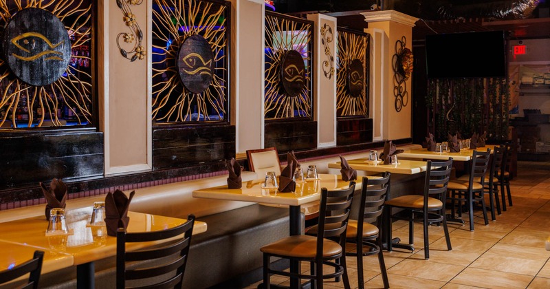 Interior, tables and chairs ready for guests