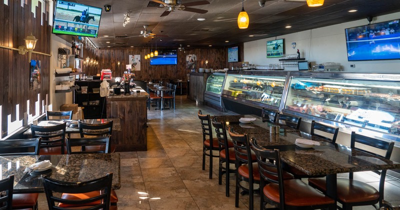 Interior, tables, chairs, refrigerated display cases, wall TV, LED TV, lights