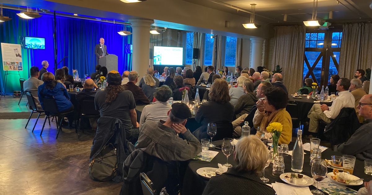 Crowd listening to a presentation