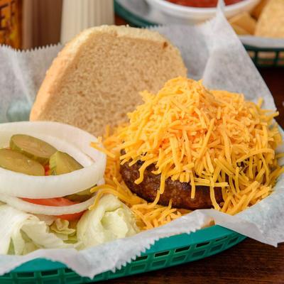 Cheeseburger, with lettuce, tomato, onion, and pickles.