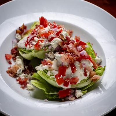 A served wedge salad.