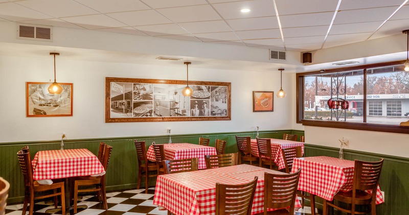 Inside, seating area with tables and chairs