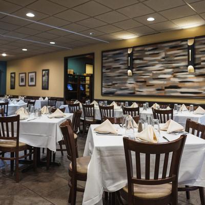 Interior, set tables, chairs, decorations, curtains, lights