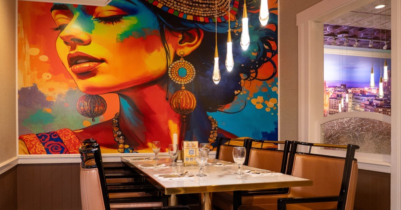 Interior, restaurant table, decorated wall in the background