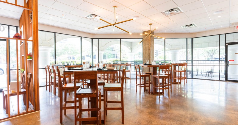 Interior seating area, tall tables and bar stools