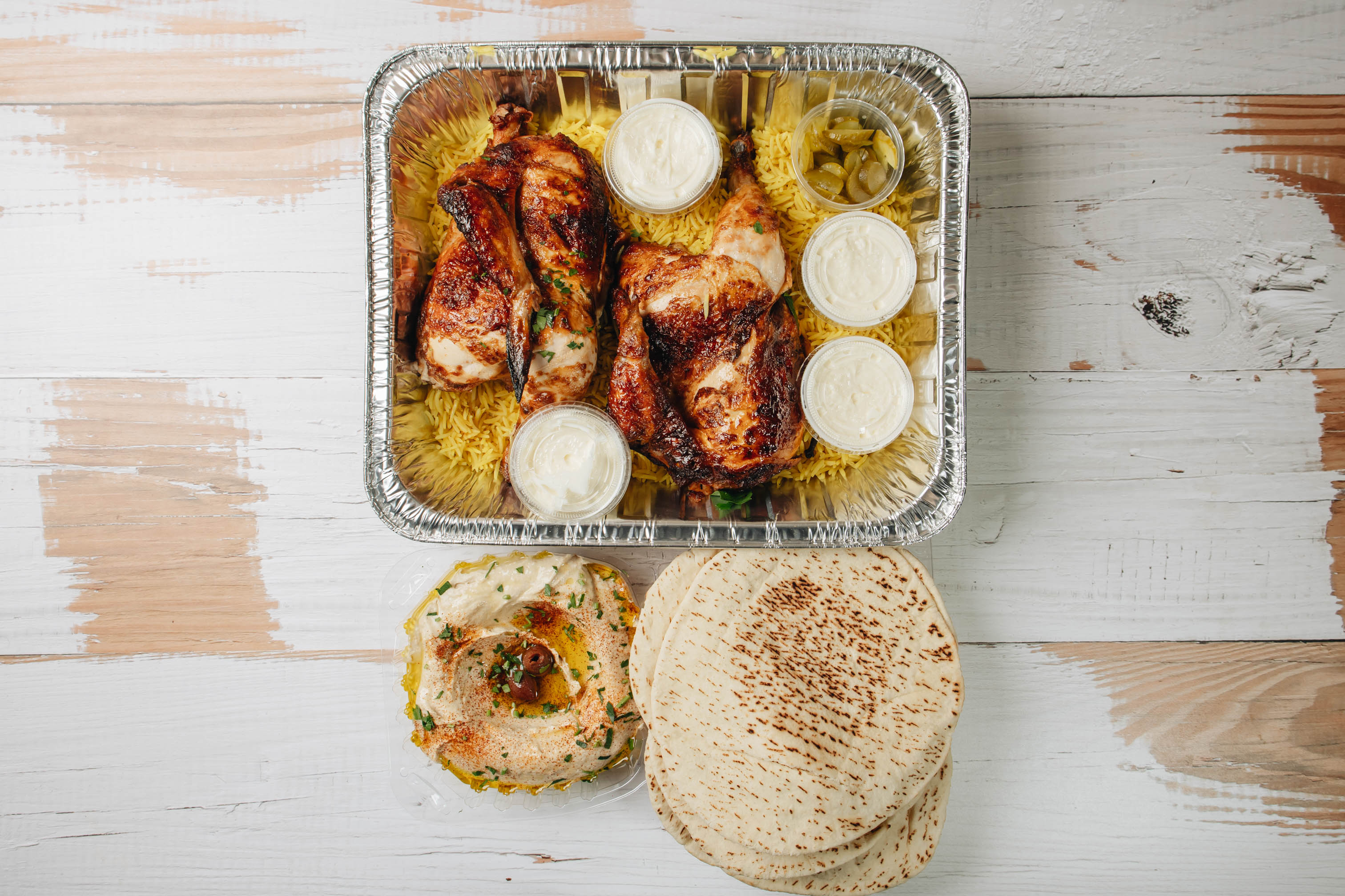 Family platter, with meat, rice, sauces and wraps