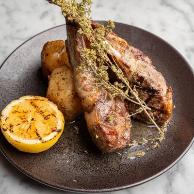 Grilled baby lamb chops with roasted lemon potatoes.