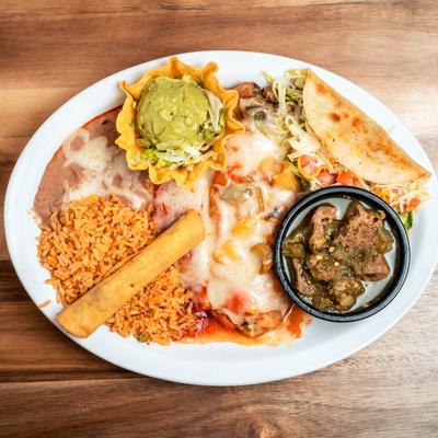 Mexican plate with cheese enchilada, chili relleno, beef flauta, and sides.