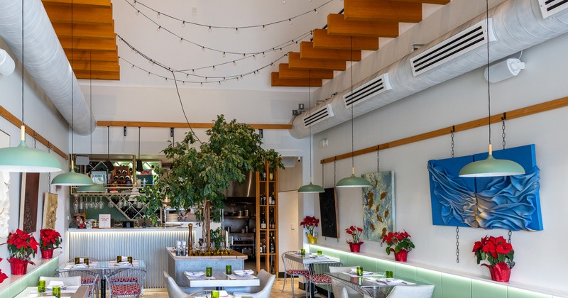 Interior, diner area, tables, chairs, part of bar