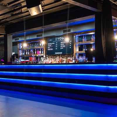 The bar area, neon lights.