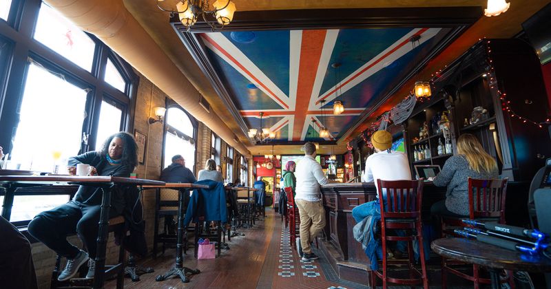 Interior, pub with guests