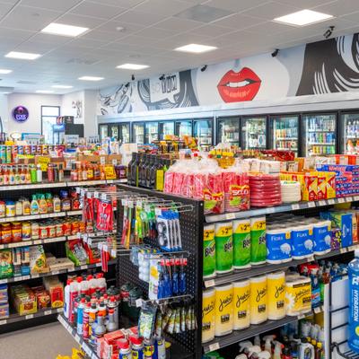 Interior fully stocked with various everyday essentials, including drinks and snacks.
