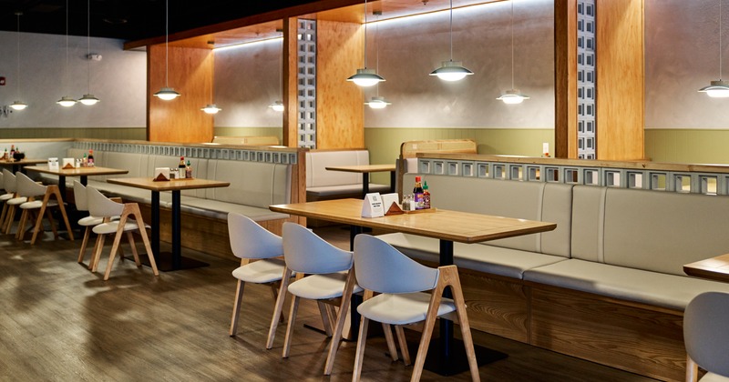 Interior, dining area with booth benches and tables