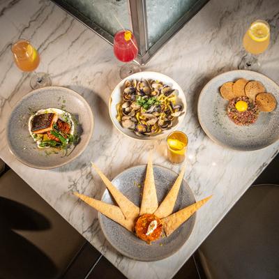 Multiple food items and drinks, top view