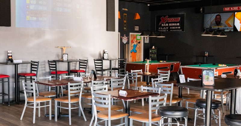 Interior, tables and chairs ready for guests