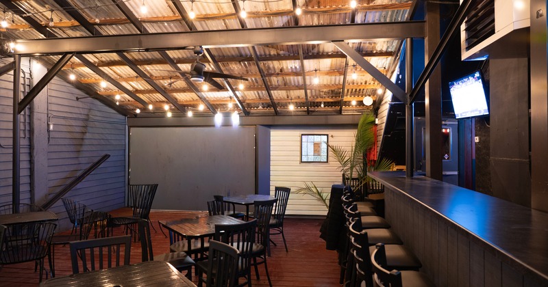 Cozy enclosed patio seating area perfect for private parties