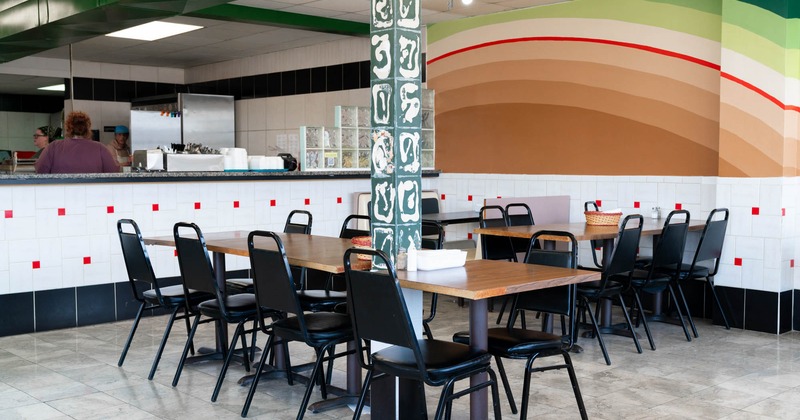 Interior, seating area with tables and chairs