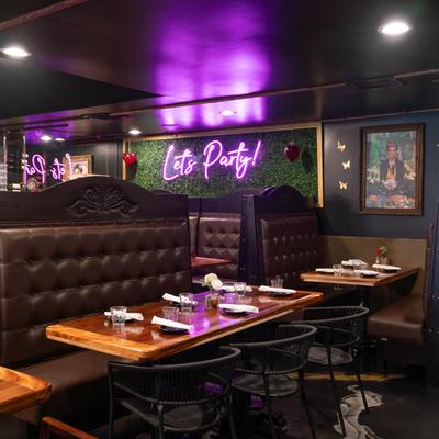 Interior with tables and chairs.