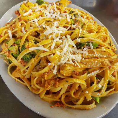 Chicken Lakeview, with linguine, broccoli, red peppers, and sun dried tomato pesto sauce.