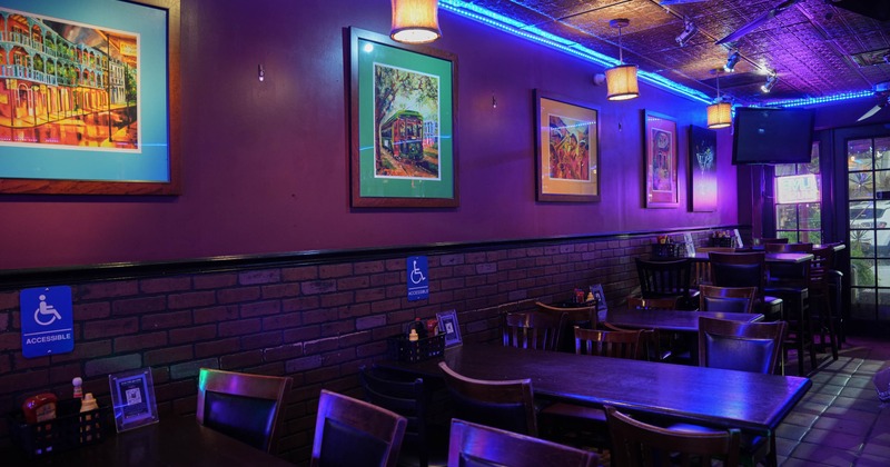 Interior, tables, framed artwork, decorative ceiling panels