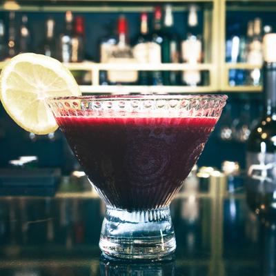 Dark red cocktail drink.