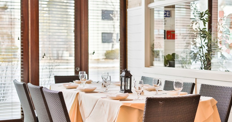 The dining table set for eight guests