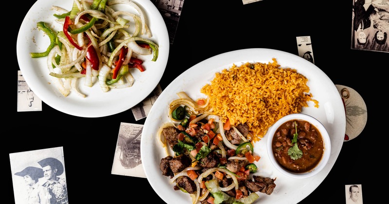 Steak chunks, with grilled veggies, rice, beans, and a side salad