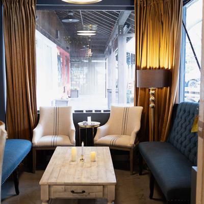 Tufted seating and a coffee table.
