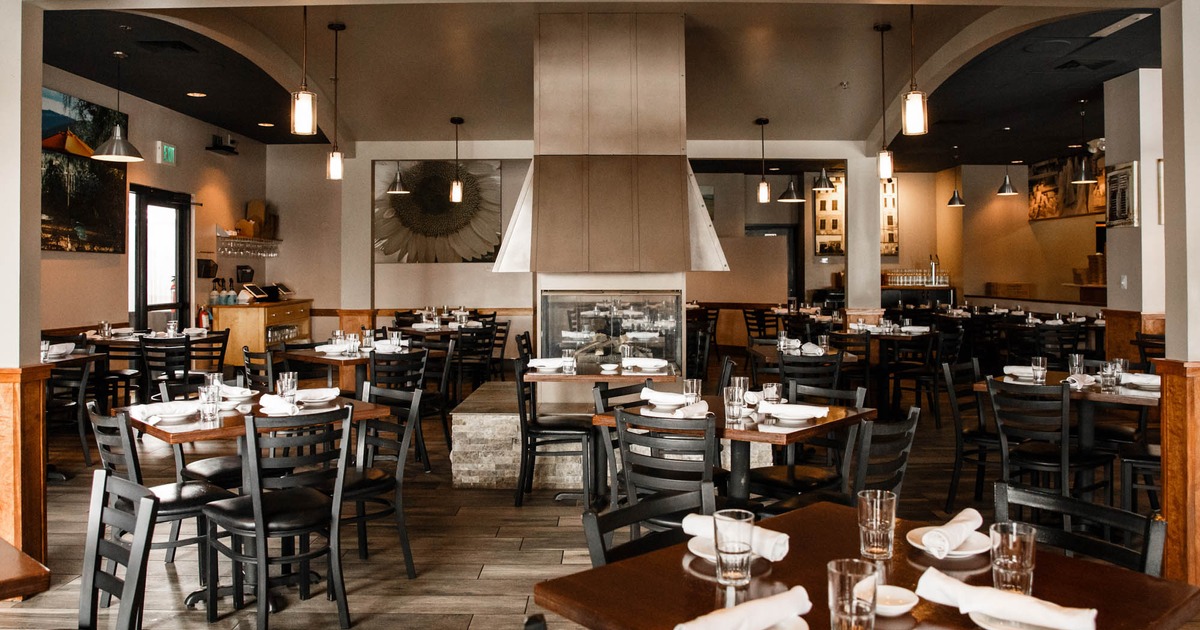 Interior, dining tables ready for guests