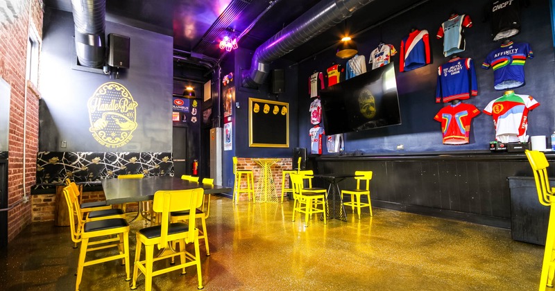 Interior, seating  by the wall side and the bar with bar chairs