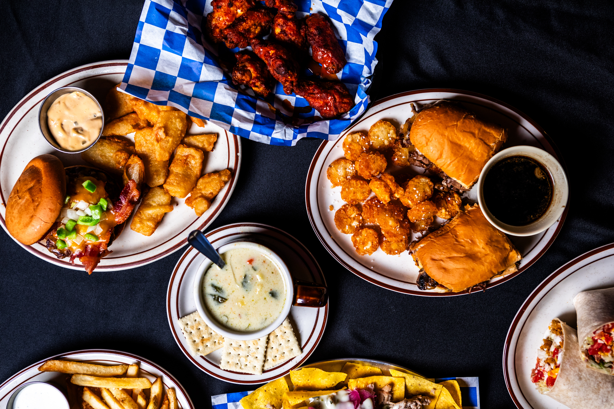 Grilled chicken, baked potato, and butter
