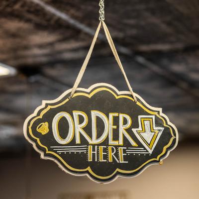Order here sign.
