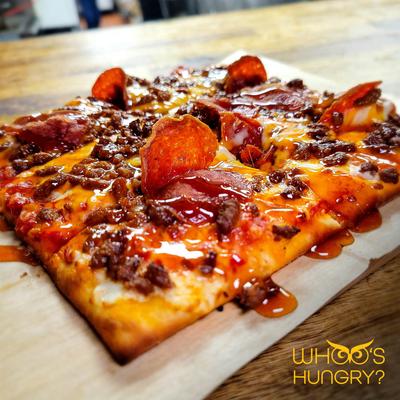 Hot honey pepperoni pizza, served.