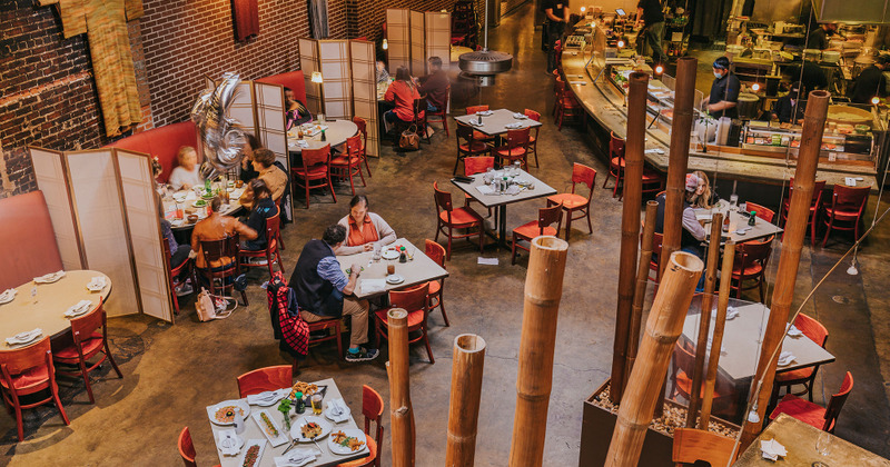 Interior, guests enjoying food and drinks