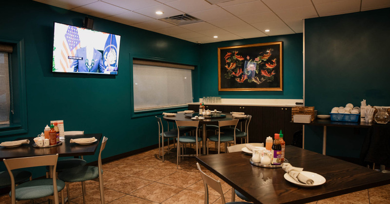 Interior, tables set with tableware