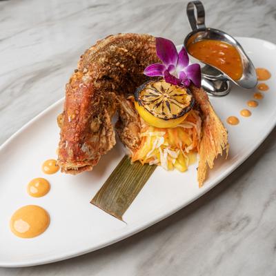 Deep fried snapper, with mango, red onions, and scallions.