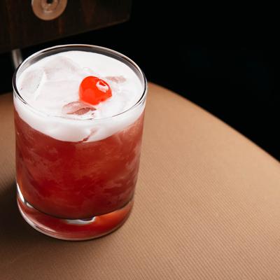 A glass of cocktail served