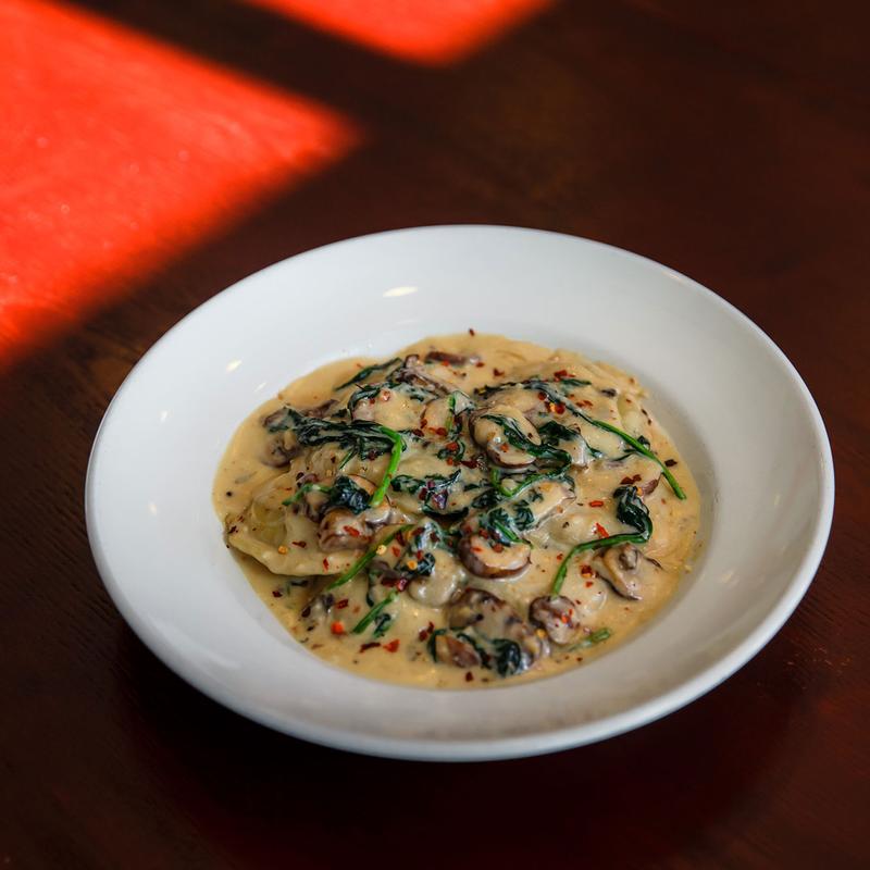 Mushroom Raviolis with Spinach. photo