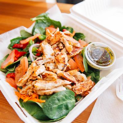 A served House Salad with Grilled Chicken.