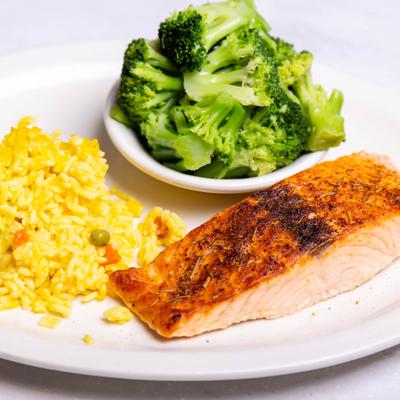 Grilled salmon, with rice and broccoli.