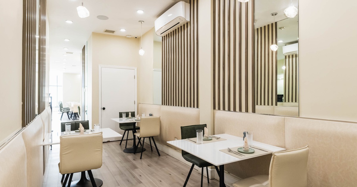 Interior, seating area with tables and chairs