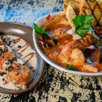 Two different beautifully arranged dishes, served together
