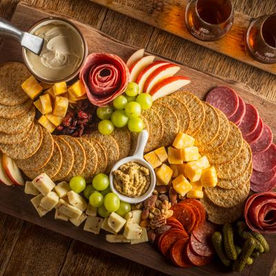 Charcuterie board paired with a whisky flight.