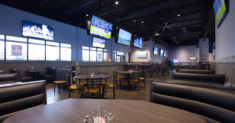 View of a dining area, TVs on the walls