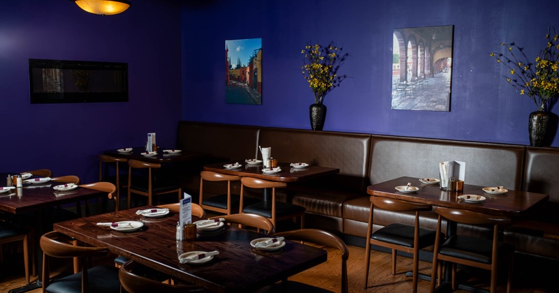 Interior, seating area with booths, tables and chairs