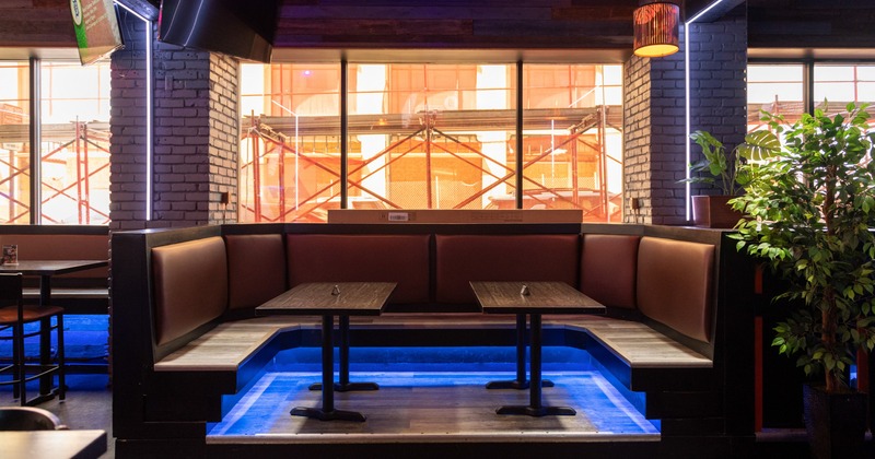Interior, seating area, booth with tables and benches