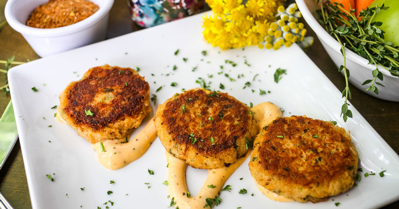 Three Crab Cakes with a Spicy Cajun Drizzle