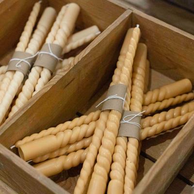 Store details, wooden compartment tray with spiral candles.